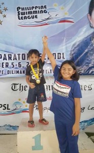 Indian Ocean All-Star Challenge multi-gold medalist Micaela Jasmine Mojdeh awards the medal to his younger brother Behrouz Mohammad during the 88th Philippine Swimming League (PSL) National Series - Inter-School/Inter-Club Motivational Yearender Swimming Meet. CONTRIBUTED PHOTO