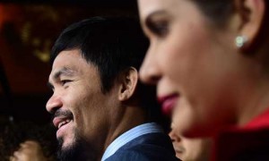 Manny Pacquiao (left) with wife Jinkee. AFP FILE PHOTO