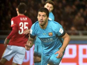 Barcelona forwardLuis Suarez celebrateshis second goal againstGuangzhou Evergrandeduring their Club WorldCup semifinals footballmatch in Yokohama onFriday. AFP PHOTO