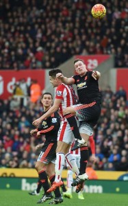 Manchester United’s English defender Phil Jones (right) jumps to win a header with Stoke City’s Dutch midfielder Marco van Ginkel during the English Premier League football match between Stoke City and Manchester United at the Britannia Stadium in Stokeon-Trent, central England on Sunday. AFP PHO