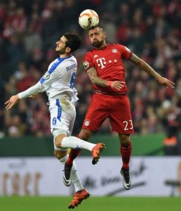 Darmstadt’s Bosnian midfielder Mario Vrancic (left) and Bayern Munich’s Chilian midfielder Arturo Vidal (right) vie for the ball vie during the German Cup DFB Pokal third round match between FC Bayern Munich and SV Darmstadt 98 in Munich on Wednesday. AFP PHOTO