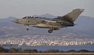 BRITAIN LOOKS TO EXPAND AIR CAMPAIGN A handout picture retrieved from the British Ministry of Defense’s Defense News Imagery website on December 1, shows a British Royal Air Force RAF Tornado GR4 pictured on return to a base on Cyprus after a mission in Iraq on September 30, 2014. Britain looks poised to join air strikes on Islamic State (IS) group targets in Syria this week after Prime Minister David Cameron announced November 30 that a vote would be held in parliament on December 2. AFP PHOTO 