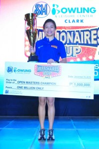 Dianne Galendez holds her trophy and P1 million check after a back-toback championship wins in the 2nd SM Millionaires Cup on Wednesday at SM City Clark in Pampanga. CONTRIBUTED PHOTO