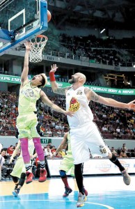 Terrence Romeo of Global Port slips through the guard of Mick Pennisi of Barako Bull during a PBA Philippine Cup game at the Mall of Asia Arena in Pasay City on Friday. PHOTO BY RUSSELL PALMA