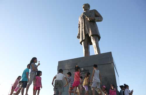Children play around the Rizal Monument in Barangay Real, Calamba City oblivious of the significance of the life and works of one of the country’s national heroes – Gat. Jose Rizal. The Philippines commemorates today, December 30, Rizal’s execution at Bagumbayan, now known as Rizal Park. PHOTO BY RUSSELL PALMA