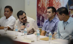 Ready to go Manila Mayor Joseph Estrada, church and other city officials discuss preparations for the feast of the Black nazarene. photo by Russel Palma 