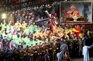 Manila Archbishop Luis Antonio Cardinal Tagle delivers a sermon during the midnight mass at Rizal Park (right) lower photo shows soldiers encircling the carriage bearing the Black Nazarene at the start of the procession. photos By Russel PAlma and Czar DanceL