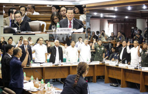 THE WHOLE TRUTH? Senators Grace Poe and Juan Ponce Enrile look on as police and military officials invited to the reopened Mamasapano inquiry take their oath as witnesses. PHOTOS BY DJ DIOSINA 