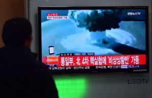 People watch a news report on North Korea's first hydrogen bomb test at a railroad station in Seoul on January 6, 2016. South Korea 