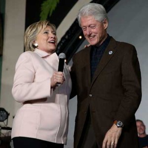 Democratic presidential candidate Hillary Clinton (R) and her husband, former US president Bill Clinton, greet supporters during a “get out the caucus” event at The Col Ballroom on Friday in Davenport, Iowa. With less than a week to go before the Iowa caucuses, Hillary Clinton is campaigning throughout Iowa. AFP PHOTO