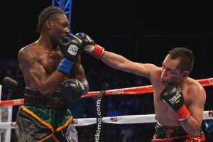 Nonito Donaire throws a punch against Nicholas Walters of Jamaica during the WBA “Super” Featherweight Title bout at StubHub Center on October 18, 2014 in Los Angeles, California. AFP PHOTO