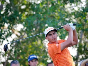 Rickie Fowler of the United States plays a shot during in the final of the Abu Dhabi Golf Championship in the capital of the United Arab Emirates on January 24, 2016. AFP PHOTO