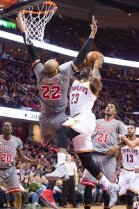 LeBron James No.23 of the Cleveland Cavaliers shoots over Taj Gibson No.22 of the Chicago Bulls during the first half at Quicken Loans Arena on Sunday in Cleveland, Ohio. AFP PHOTO