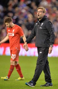 Liverpool’s German manager Jurgen Klopp celebrates on the pitch after winning the penalty shoot-out in the English League Cup semifinals second leg football match between Liverpool and Stoke City at Anfield in Liverpool, north west England, on Wednesday. AFP PHOTO