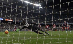 Barcelona’s Argentinian forward Lionel Messi (right) scores a penalty during the Spanish league football match FC Barcelona vs Athletic Club Bilbao at the Camp Nou stadium in Barcelona on Monday. AFP PHOTO