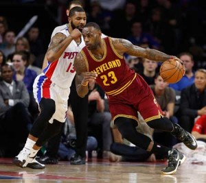 LeBron James No.23 of the Cleveland Cavaliers drives around Marcus Morris No.13 of the Detroit Pistons during the first half at the Palace of Auburn Hills on Saturday in Auburn Hills, Michigan. AFP PHOTO