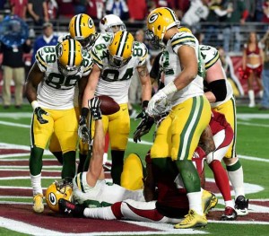 Wide receiver Jeff Janis No.83 of the Green Bay Packers celebrates his game-tying touchdown at the end of regulation in the NFC Divisional Playoff Game at University of Phoenix Stadium on January 16, 2016 in Glendale, Arizona. The Arizona Cardinals beat the Green Bay Packers 26-20 in overtime.  AFP PHOTO