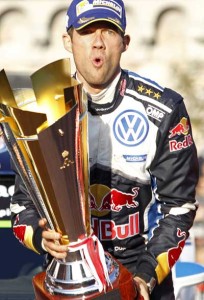 French driver Sebastien Ogier celebrates his victory with his trophy during the podium ceremony for the 84th Monte Carlo Rally in Monaco. AFP PHOTO