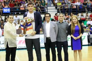 Junmar Fajardo receives the Best Conference Player award during Game 4 of the best-of-seven finals between San Miguel Beer and Alaska at Philsport Arena in Pasig City on Sunday. PHOTO BY CZEASAR DANCEL