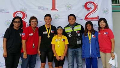 Makati City Mayor Romulo “Kid” Pena poses with Bicol Region Regional Director Fiscal Ma. Teresa Mahiwo, Philippine Swimming League President Susan Papa and Secretary General Maria Susan Benasa, and record-breakers Sean Terence Zamora, Micaela Jasmine Mojdeh and Kyla Soguilon. CONTRIBUTED PHOTO