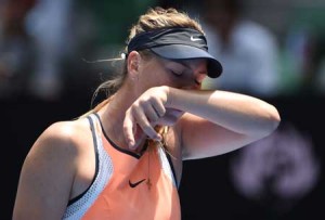 Russia’s Maria Sharapova gestures during her women’s singles match against Serena Williams of the US on day nine of the 2016 Australian Open tennis tournament in Melbourne on Tuesday. AFP PHOTO