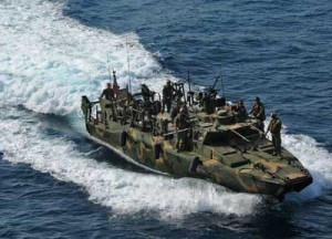 This US Navy photo released January 12, 2016, shows the type of riverine command boat apprehended by Iran on January 12, 2106. US officials said they were working to recover 10 US Navy personnel who lost radio contact and were apprehended, in riverine command boat’s on January 12, 2016 after straying into Iranian territorial waters. In the picture, a boat from Riverine Detachment 23 operates with the amphibious transport dock ship USS New York (LPD 21), not pictured, during a maritime air support operations center exercise on June 12, 2012. AFP PHOTO