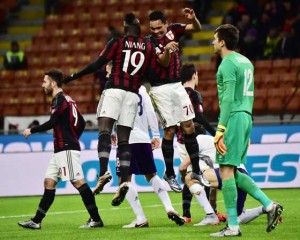AC Milan’s Colombian forward Carlos Bacca (second right) celebrates with teammates after scoring a goal during the Serie A footballmatch between AC Milan and Fiorentina at the San Siro Stadium in Milan on Monday. AFP PHOTO