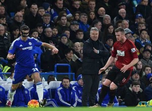 Chelsea’s Dutch manager Guus Hiddink (second right) watches from the touchline during the English Premier League football match between Chelsea and West Bromwich Albion at Stamford Bridge in London on Thursday. AFP PHOTO