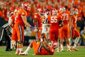 Deshaun Watson No.4 of the Clemson Tigers lies on the turf in the third quarter against the Alabama Crimson Tide during the 2016 College Football Playoff National Championship Game at University of Phoenix Stadium on Tuesday in Glendale, Arizona. AFP PHOTO