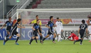 Japan’s midfielder Riki Harakawa (No.7) celebrates with his teammates after scoring their second goal to win the AFC U23 Championship semifinals football match between Iraq and Japan in Doha on Wednesday. AFP PHOTO