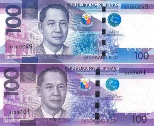 NEW BANKNOTE Top: Old 100-peso banknote. Bottom: New 100-peso banknote with stronger mauve.
