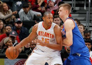 Al Horford (No. 15) of the Atlanta Hawks drives against Kristaps Porzingis of the New York Knicks at Philips Arena in Atlanta, Georgia. FILE AFP PHOTO