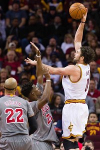 Kevin Love of the Cleveland Cavaliers shoots over Jimmy Butler of the Chicago Bulls during the second half at Quicken Loans Arena on Saturday (Sunday in Manila) in Cleveland, Ohio. AFP PHOTO