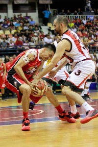 Cyrus Baguio (No.3) of the Alaska Aces battles for the ball against Chris Lutz (No.3) of San Miguel Beer during Game 4 of the best-of-seven finals of the PBA Philippine Cup at Philsport in Pasig City on Sunday. PHOTO BY CZEASAR DANCEL