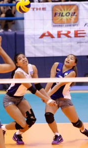 Ateneo de Manila University’s Alyssa Valdez (left) and Gizelle Tan prepare to receive the ball during the elimination round of the University Athletic Association of the Philippines Season 78 women’s volleyball tournament on Sunday at The Arena in San Juan City. photo by CZAR DANCEL