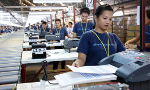 Vital test Workers test the accuracy of the vote counting machines delivered by Smartmatic. Photo by Russell Palma