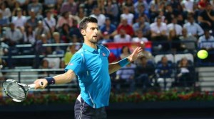 Novak Djokovic of Serbia returns the ball to Tunisian Malek Jaziri during their ATP tennis match on the third round of the Dubai Duty Free Tennis Championships on Thursday. World number one Novak Djokovic recorded his 700th career win when he cruised past Tunisia’s Malek Jaziri and into the Dubai quarterfinals. AFP PHOTO 