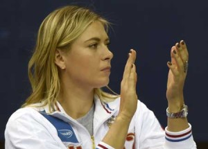 Russia’s Maria Sharapova applauds a point during the Federation Cup tennis world group first round match between Russia and Netherlands in Moscow on Monday. AFP PHOTO