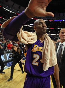 Kobe Bryant No.24 of the Los Angeles Lakers waves to the crowd after a game against the Chicago Bulls at the United Center on Monday in Chicago, Illinois. The Bulls defeated the Lakers 126-115. AFP PHOTO