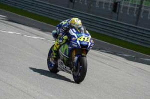 Movistar Yamaha MotoGP’s Italian rider Valentino Rossi rides his bike on the main straight during the second day of 2016 MotoGP preseason test at the Sepang International circuit on Tuesday. AFP PHOTO