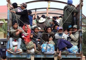 MYANMAR UNREST GROWS  People flee conflict areas near the Myanmar-China border aboard a truck on February 15, as clashes between ethnic armed groups and the military escalated, displacing thousands of civilians. AFP PHOTO