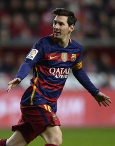 Barcelona’s Argentinian forward Lionel Messi celebrates after scoring a goal during the Spanish league football match Real Sporting de Gijon vs FC Barcelona at El Molinon stadium in Gijon, on Thursday. AFP PHOTO