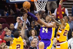 Kyrie Irving No.2 and LeBron James No.23 of the Cleveland Cavaliers try to stop Kobe Bryant No.24 of the Los Angeles Lakers during the second half at Quicken Loans Arena on Thursday in Cleveland, Ohio. AFP PHOTO