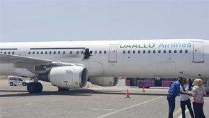 NEAR-DISASTER  A one-meter hole is seen on the side of a Daallo Airlines jetliner after it returned safely to Mogadishu despite a suicide bomber exploding a bomb hidden in a laptop shortly after takeoff on February 4. The bomber, whose badly charred remains were found some 30 kilometers from Mogadishu, was the only fatality in the attack. AFP PHOTO