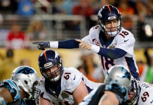 Peyton Manning No.18 of the Denver Broncos signals at the line of scrimmage in the second half against the Carolina Panthers during Super Bowl 50 at Levi’s Stadium on Monday in Santa Clara, California. AFP PHOTO