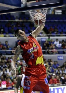 Raymond Almazan of Rain or Shine executes a power dunk. PHOTO BY CZEASAR DANCEL