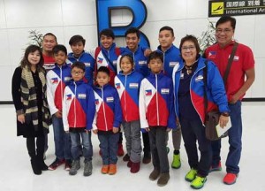 The Philippine Swimming League delegation headed by President Susan Papa and Secterary General Maria Susan Benasa with coaches Alex Papa and Marlon Dula. CONTRIBUTED PHOTO