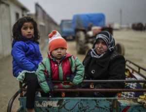 STRANDED  Refugee children wait at the Turkish border crossing as Syrians fleeing the embattled city of Aleppo gather in Bab al-Salama, near the northern Syrian city of Azaz, on February 6. AFP PHOTO