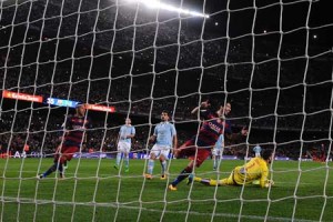 Barcelona’s Uruguayan forward Luis Suarez (second right) celebrates his goal after a penalty kick with Barcelona’s Brazilian forward Neymar (left) during the Spanish league football match FC Barcelona vs RC Celta de Vigo at the Camp Nou stadium in Barcelona on Monday. AFP PHOTO