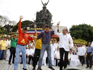 THE JUMP President Benigno Aquino 3rd (right) joins former President Fidel Ramos and Bobby Aquino, son of former senator Butch Aquino, for the “signature” EDSA jump during the commemoration of the 30th anniversary of the people power revolution. PHOTO BY MIKE DE LEON